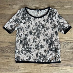 Forever 21 tan lace short sleeved too with black floral detail. Size M